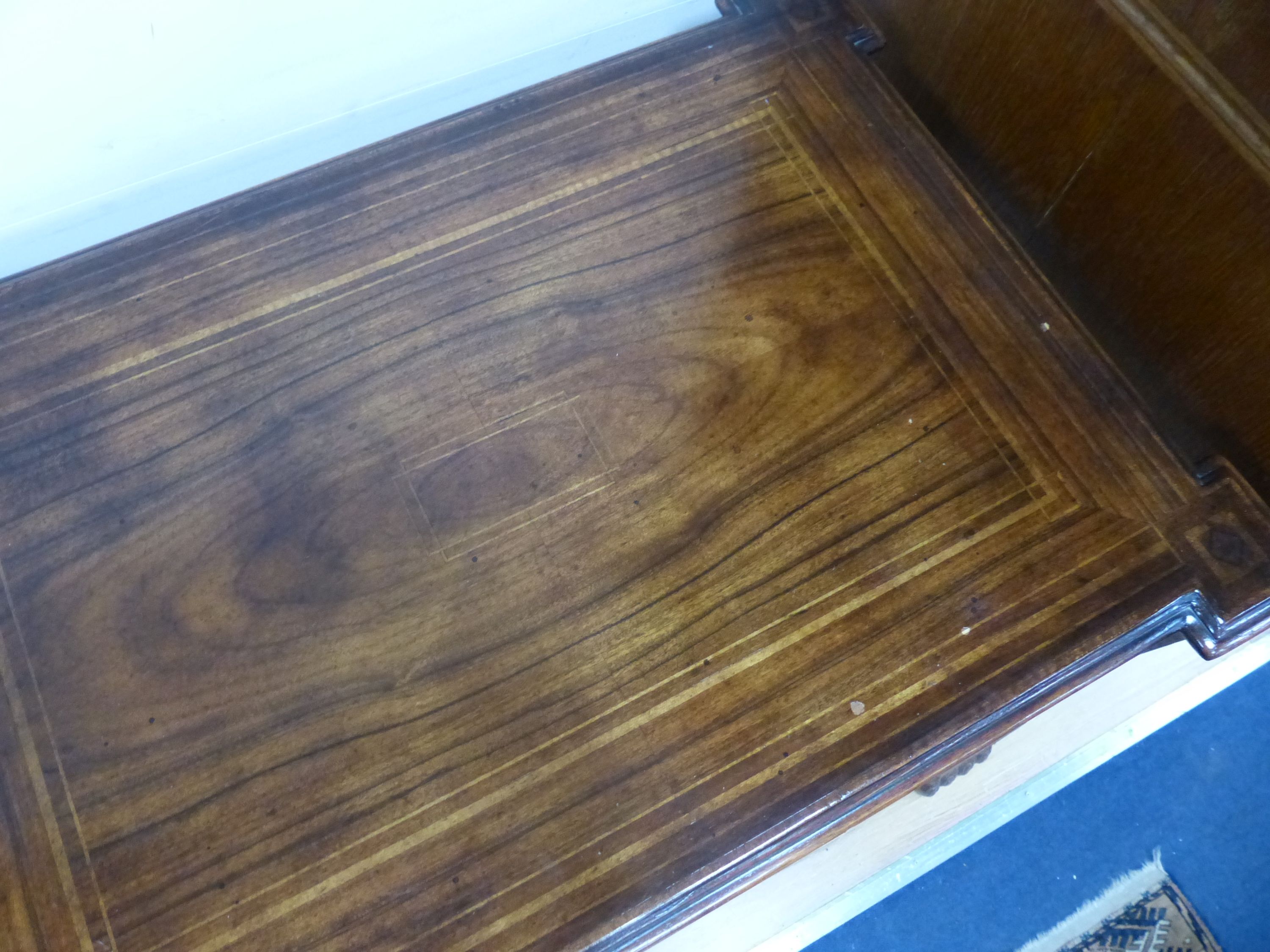 An 18th century style rectangular walnut hinge top enclosed dressing table, width 66cm, depth 46cm, height 76cm
